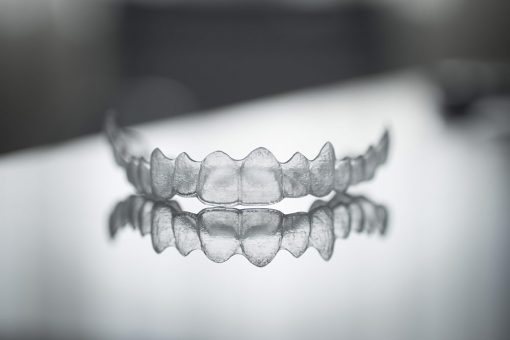 How to Correct a Smile with Veneers or Invisalign in Philadelphia